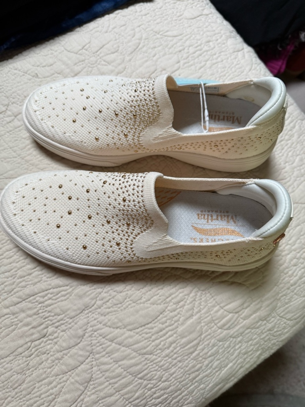 Skechers Slip-On Knit Sneakers in Ivory with Gold Accents